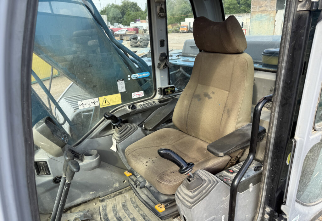 2006 New Holland E 265 Bagger